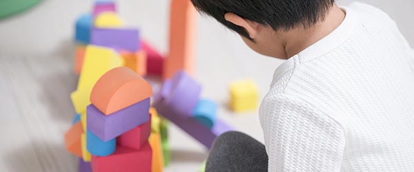 Student building with stacking blocks